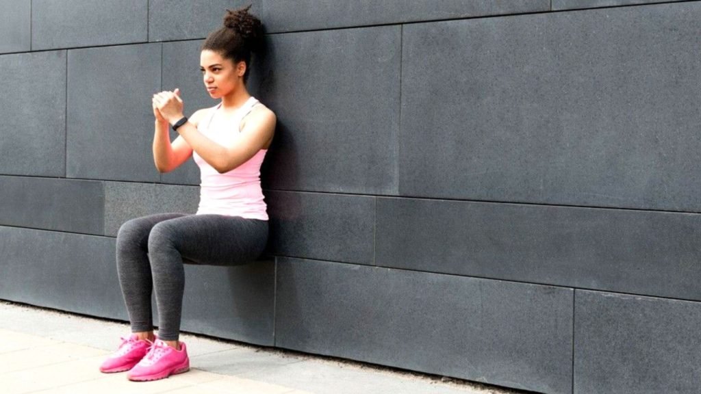 strengthen quads with knee pain - wall squats 